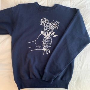 Navy Blue crewneck, hand w/ flowers image